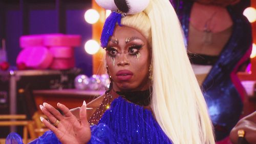 Monique Heart looking mad in a cookie monster outfit.
